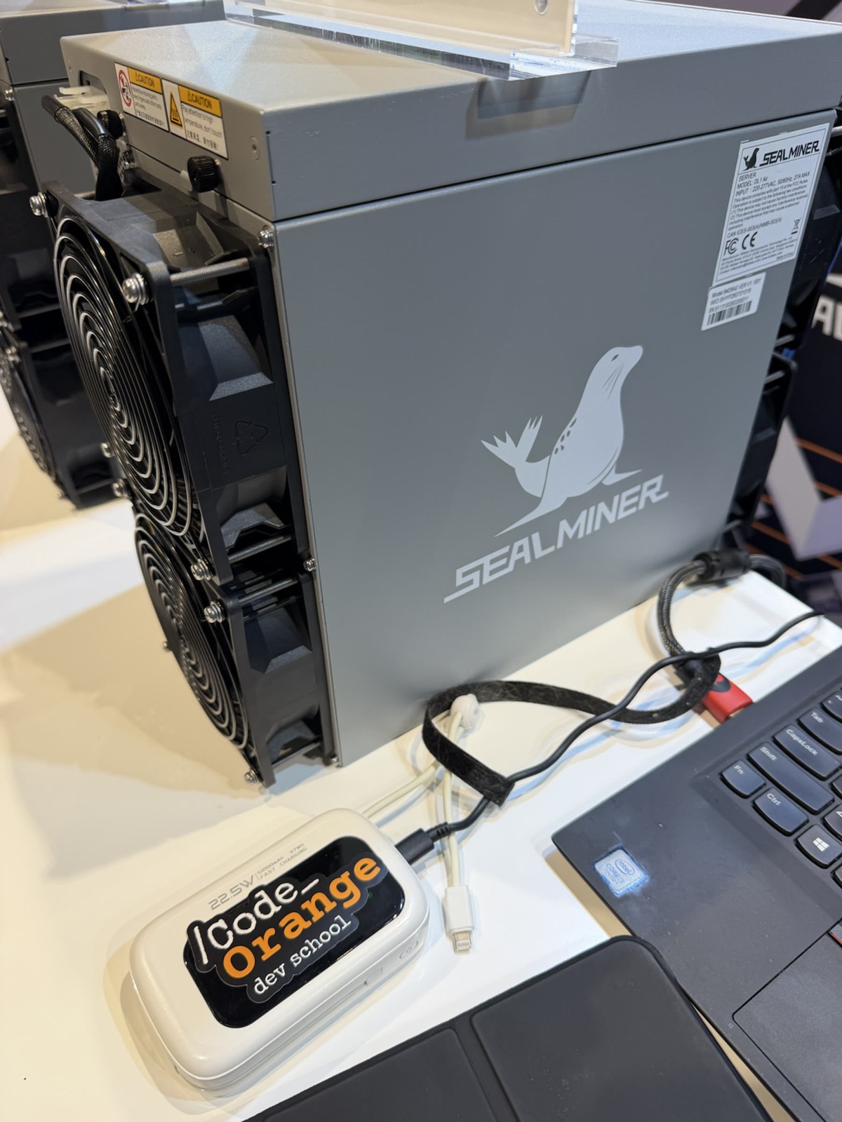 Close-up of Code Orange Bitcoin mining hardware